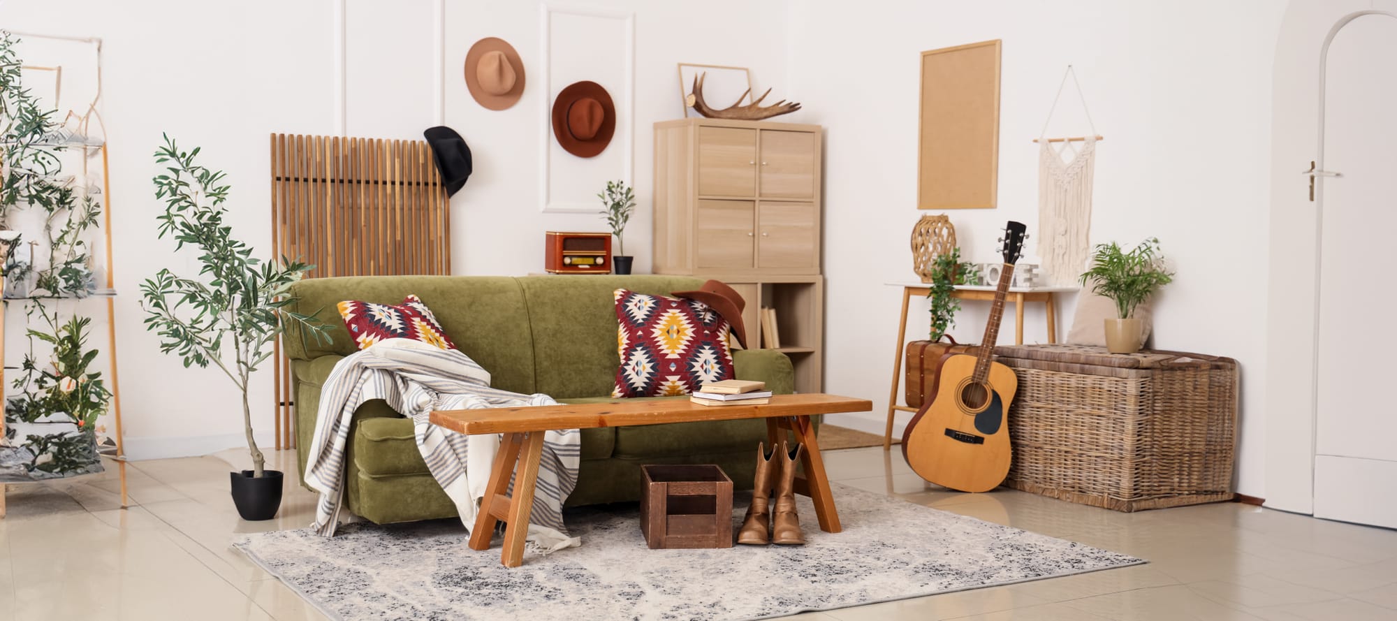 Photo of a living room with couch, coffee table, and other personal objects.