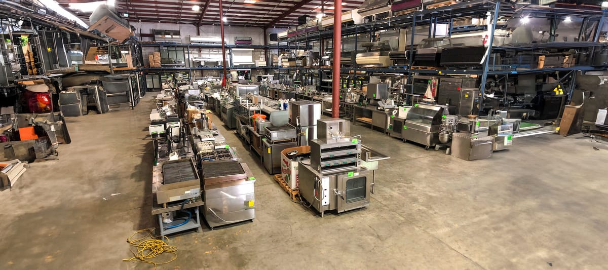 A photo of a food service equipment warehouse that Grafe Auction worked with.