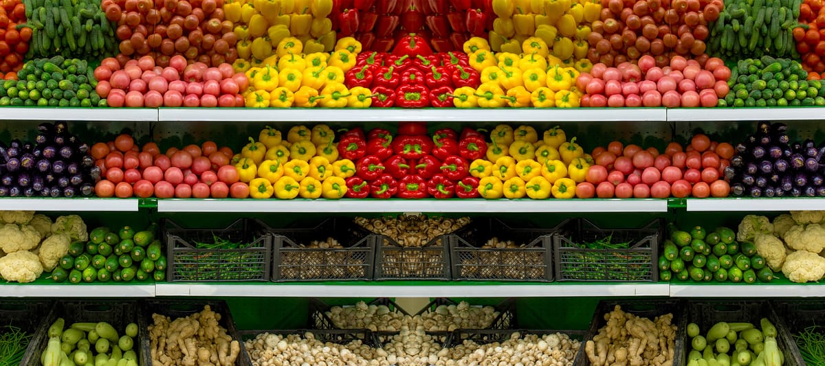 Vegetables on a shelf in a supermarket.